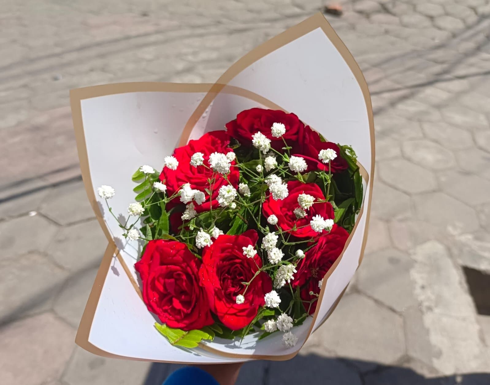 Small-Red-Rose-White-Paper — fresh bouquet delivery near TIA, Kathmandu
